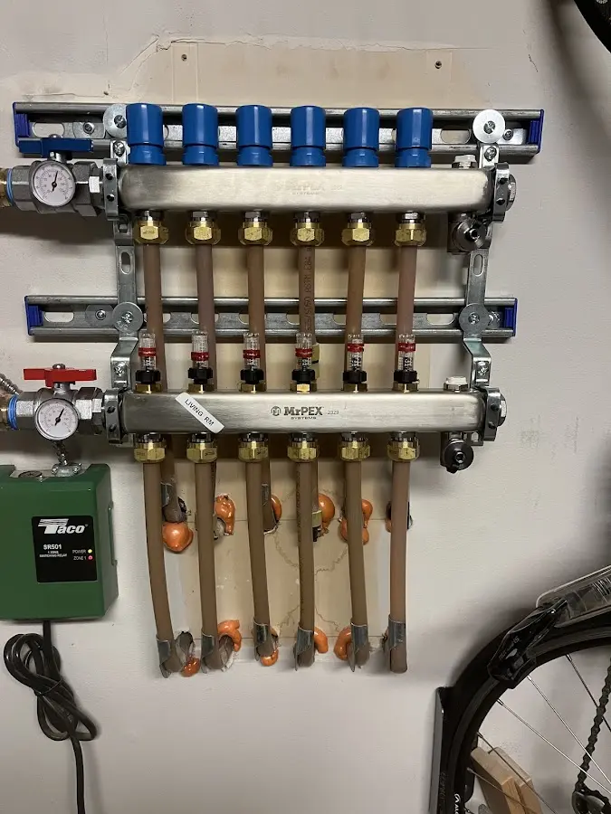 Plumber performing Water Heater Repair at a residential property in Des Plaines